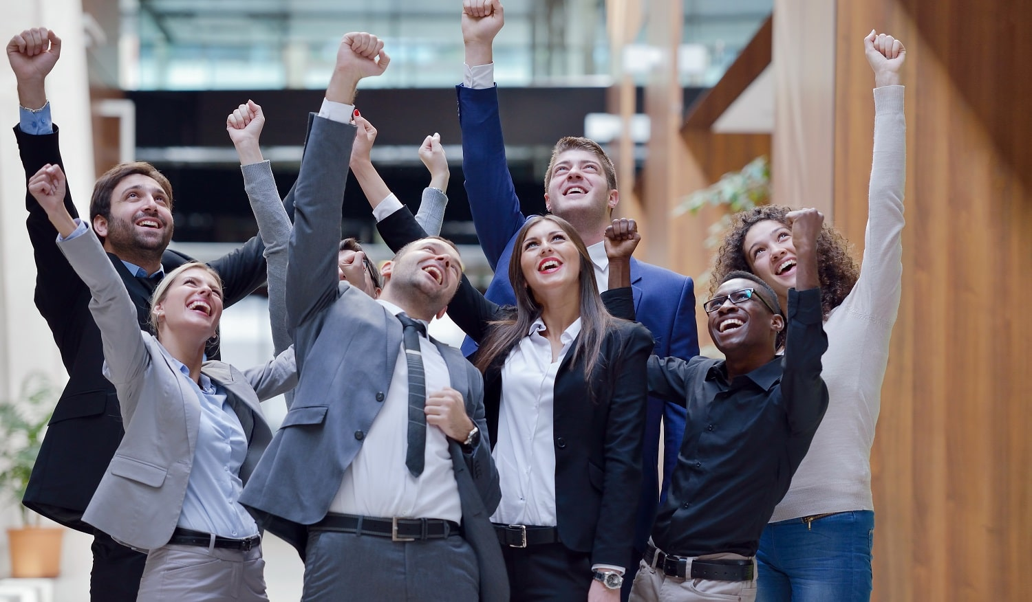 a business team celebrating a win